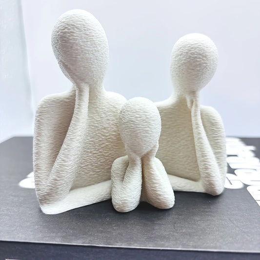 Abstract family sculpture symbolizing warmth and connection, crafted in minimalist style. Perfect for modern home decor.